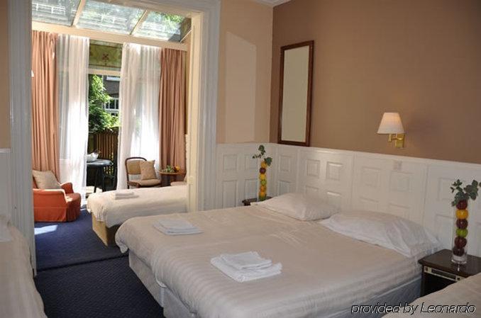 Apple Inn Hotel Άμστερνταμ Δωμάτιο φωτογραφία