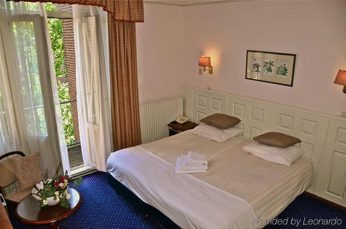 Apple Inn Hotel Άμστερνταμ Δωμάτιο φωτογραφία